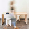 Wooden Rectangular TableBlurred Person Walking Past a Plywood Dining Table Desk in Natural