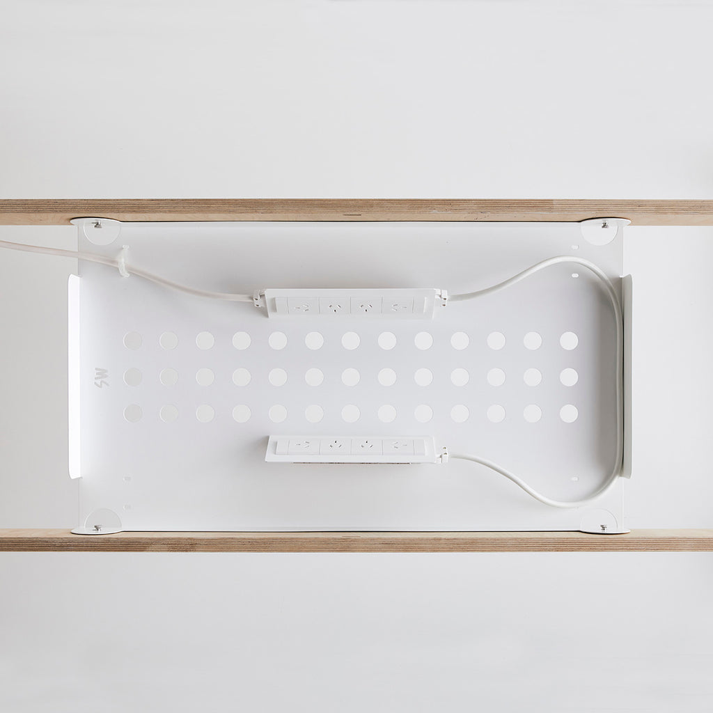 View of the Table Cable Management Cut-Out with Electric Outlet