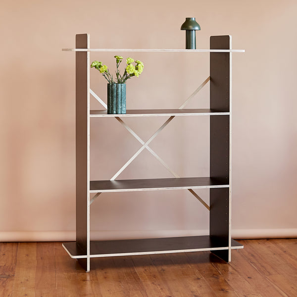 Black and white shelf with a decorative vase, highlighting a minimalist aesthetic