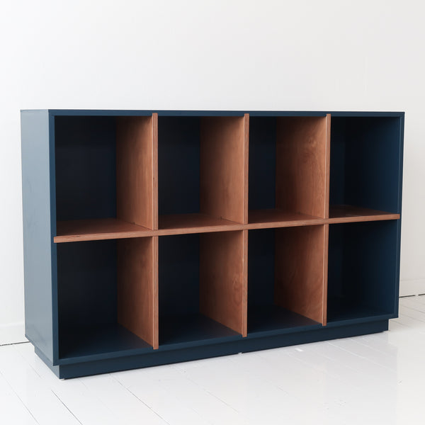 Finished blue and wood 8-cubby storage unit
