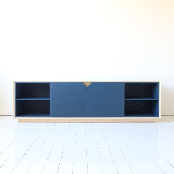Blue plywood OSB media cabinet with a long design