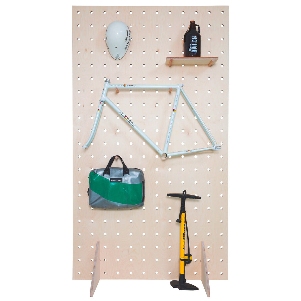 Front View Wooden & Plywood Pegboard with Hanged Bike Accessories