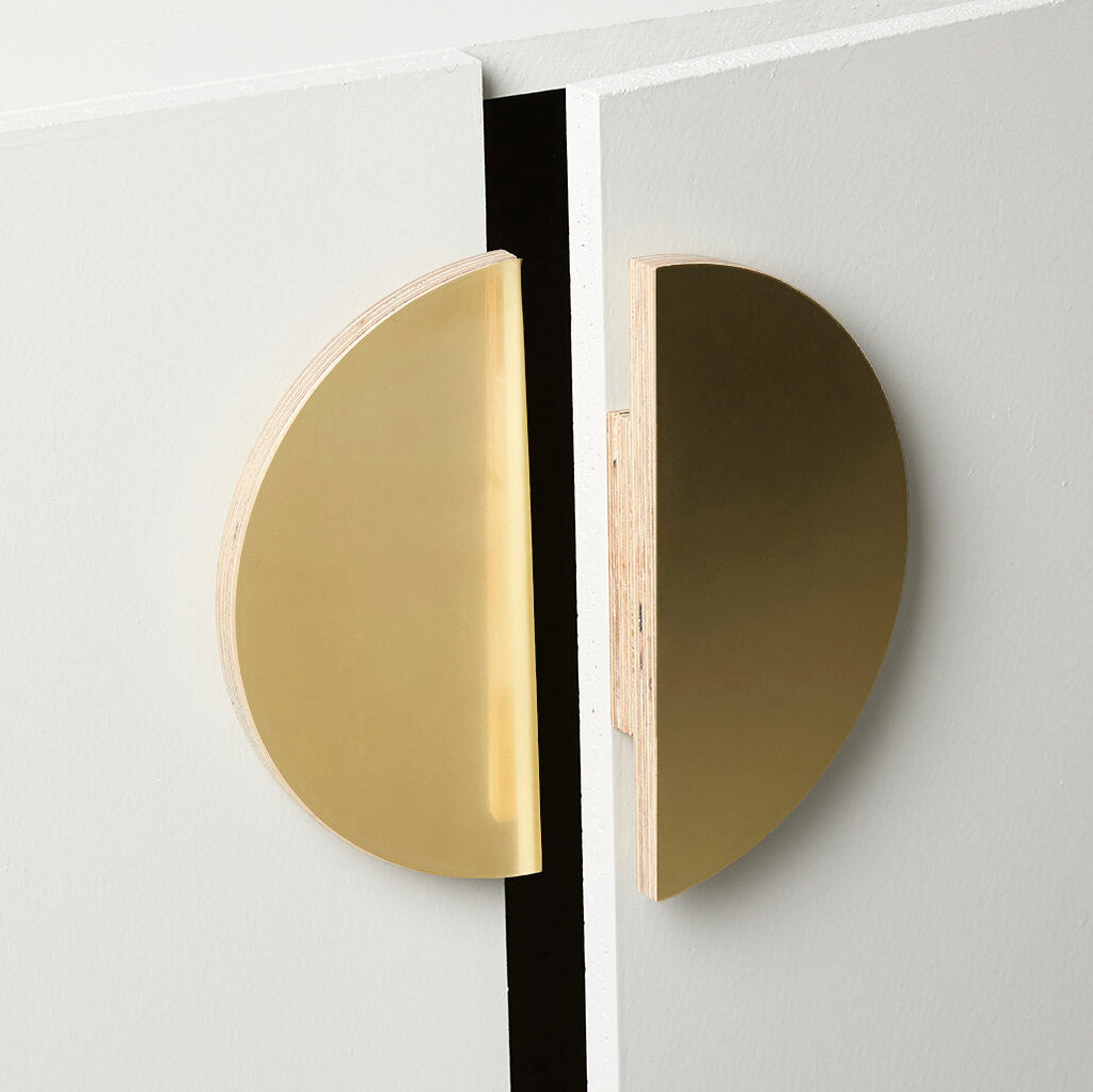 Slightly Opened Cabinet with Small-Sized Plywood Round Half Moon Handle in Brass Color
