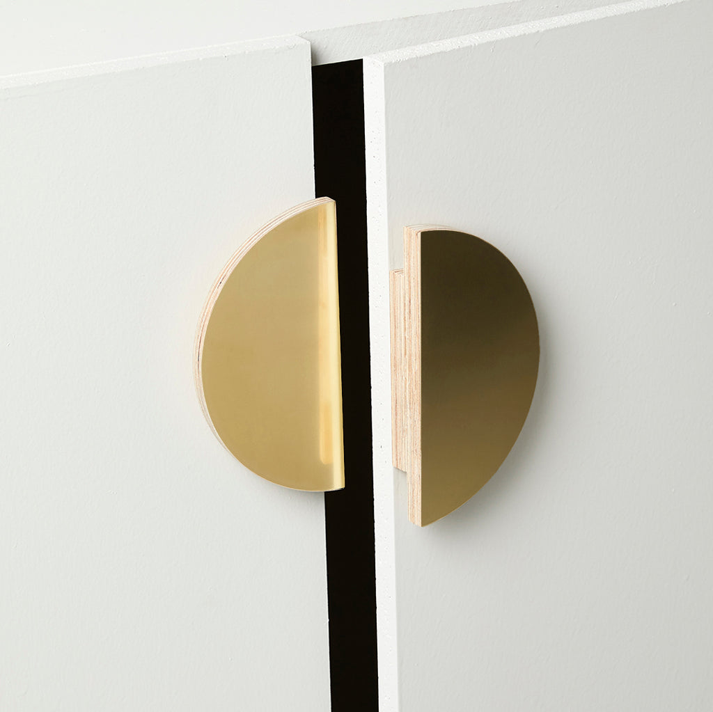 Slightly Opened Cabinet with Medium-Sized Plywood Round Half Moon Handle in Brass Color
