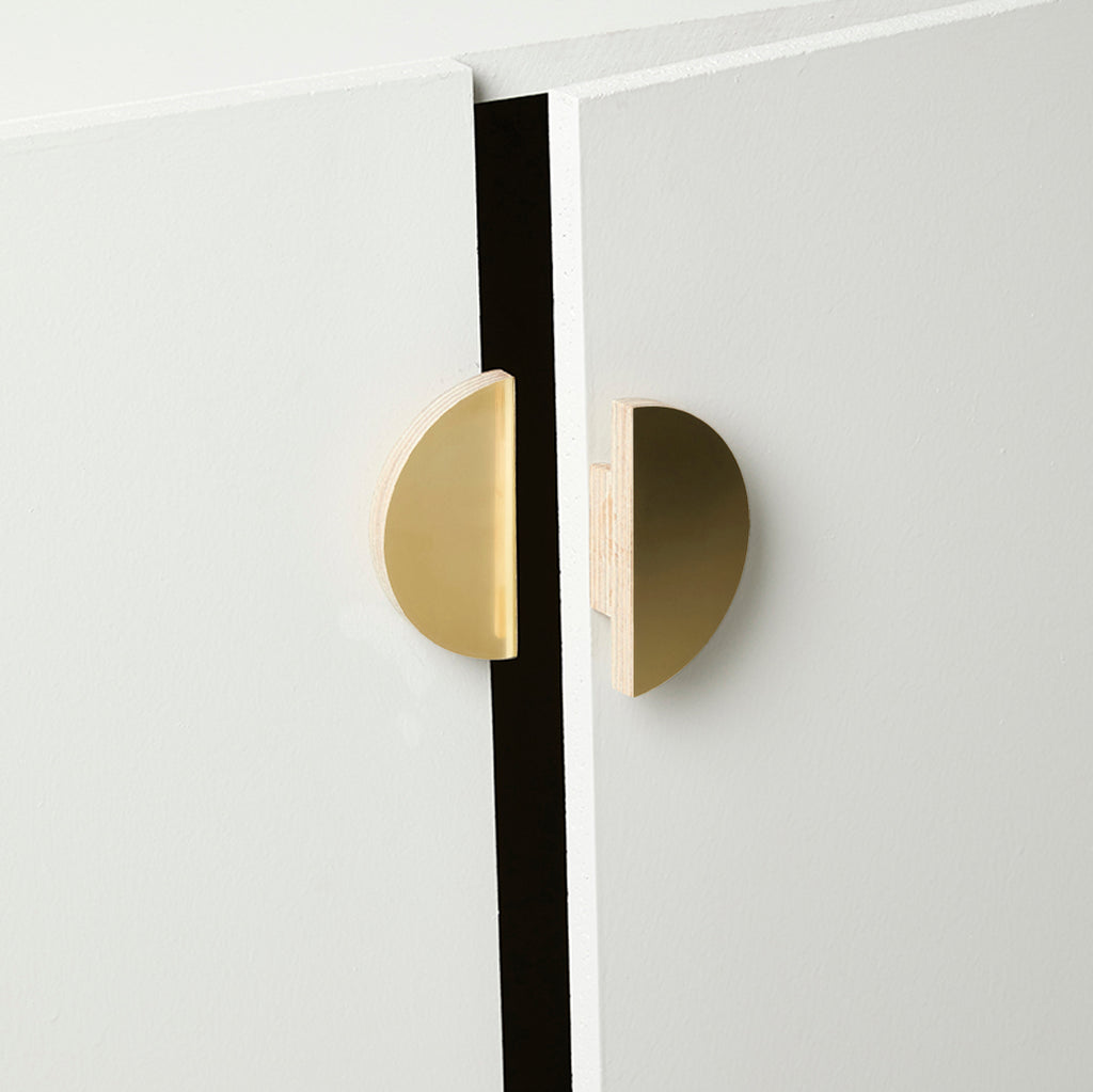Slightly Opened Cabinet with Small-Sized Plywood Round Half Moon Handle in Brass Color
