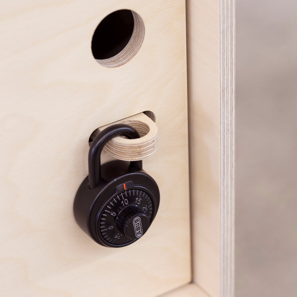 Close-Up View of a Natural Coloured Plywood Locker Locked with a Rotary Combination Padlock